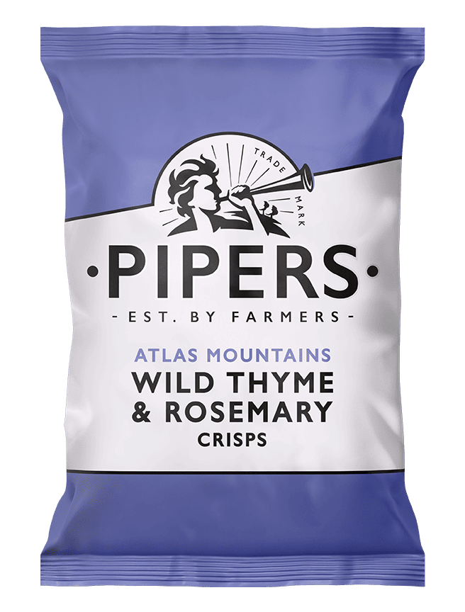 Pipers wild thyme & rosemary crisps packaging on a green background