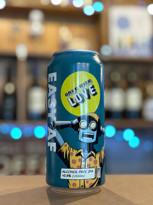 Alcohol-free IPA can with robot illustration on a blurred bar background