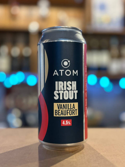 Can of Atom Irish Stout Vanilla Beaufort on a bar counter with a blurred bar background